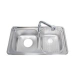 Connie Toto stainless steel kitchen sink is partially below the surface